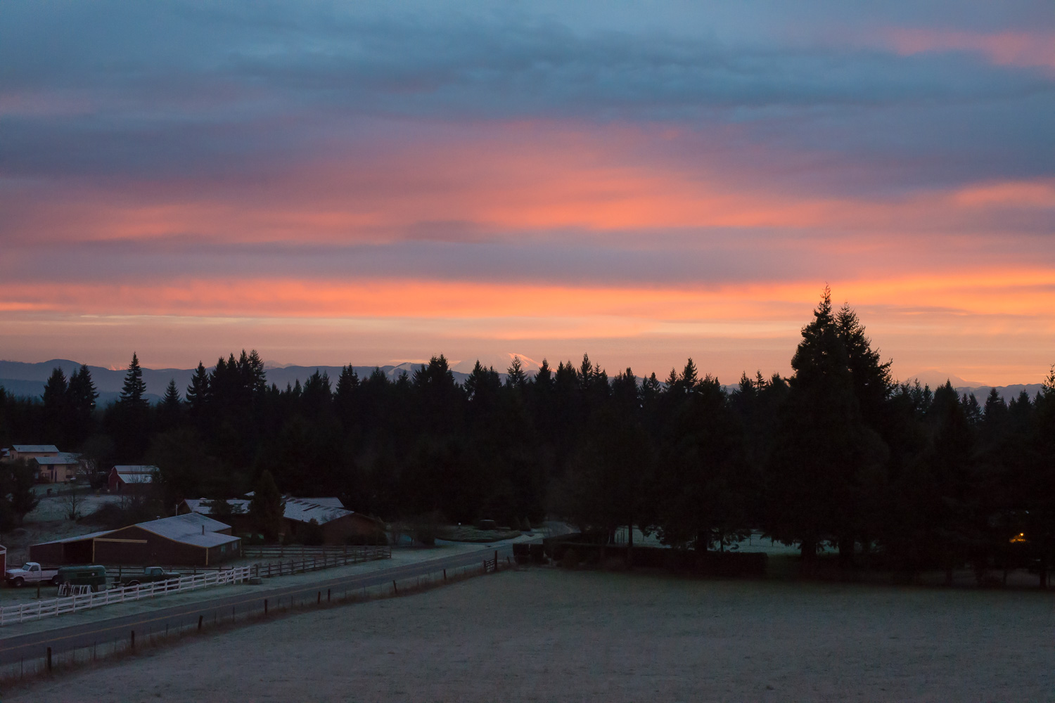 Color image of a pink & purple sunrise in the Winter.